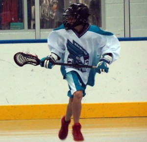 Riley Roe playing for the Rochester Knighthawks