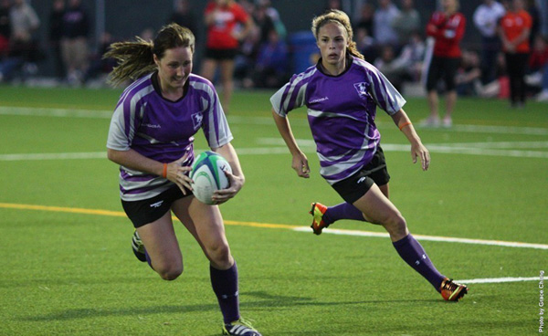 Breanne Nicholas (right) supporting her Western Mustangs Rugby teammate - Photo by Grace Chung