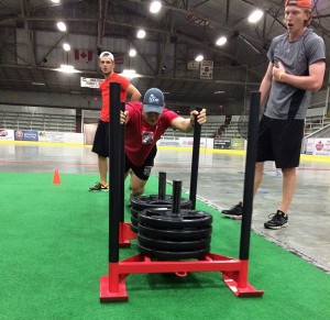 Phase 3 - 2014 OHL Draft pick Brady Pataki sled push marching.  These are great for developing speed and power, and a quicker first step.