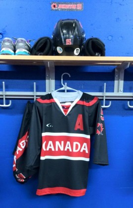 Mallory Johnston's jersey hanging in Canada's dressing room - Contributed Photo