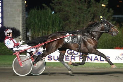 Hall of Fame driver John Campbell pilots Tony Soprano to a 1:55.1 victory in the two-year-old trotting colt Super Final at Woodbine Racetrack on Oct. 10. The colt was the second of two Super Final winners trained by Windsor, ON resident Bob McIntosh. (New Image Media photo)  