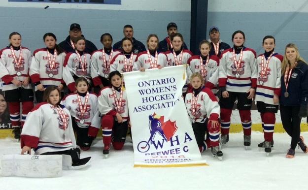 The Wallaceburg Peewee 'C' girls celebrate an OWHA silver - Contributed Photo