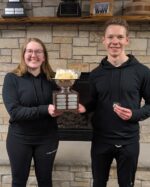 Oliver Campbell competing at mixed doubles curling nationals